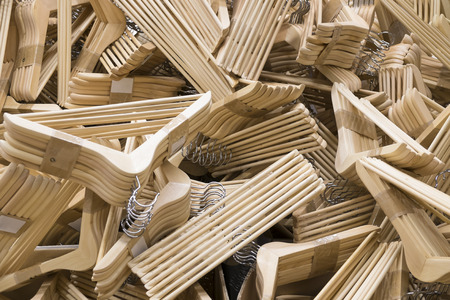 cloth hanger made of wood in pack disorder  stackingの写真素材
