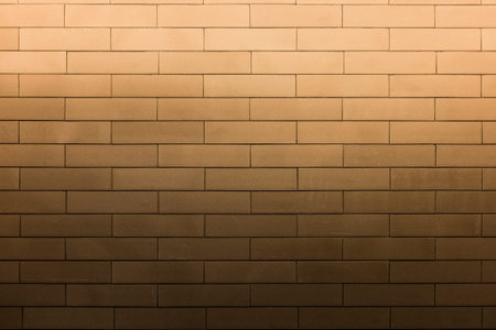 bright light flood on top of brown texture brick wall pattern