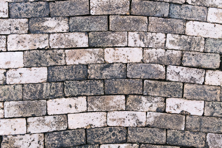 old rustic terracotta clay brick curve pattern flooringの写真素材