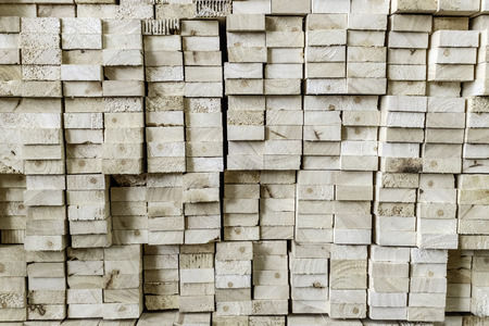 thick pine wood plank stacking in vertical rowの写真素材