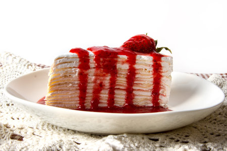 Crepe cake with strawberry topping の写真素材
