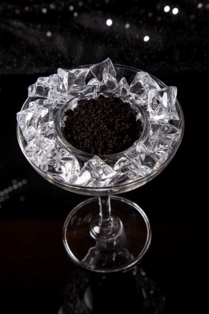 Black caviar served on ice.の写真素材