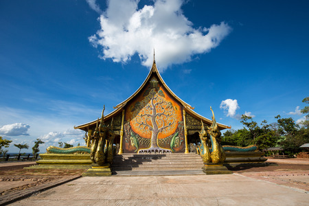 Eastern style Thai temple with the beautiful mosaic wall.の写真素材