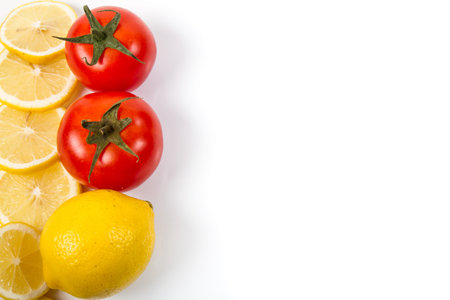 Fresh tomato and lemon on white background.の写真素材