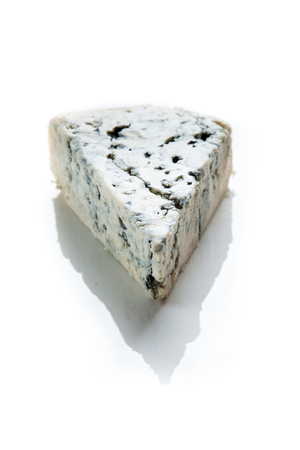 A piece of blue cheese.の写真素材