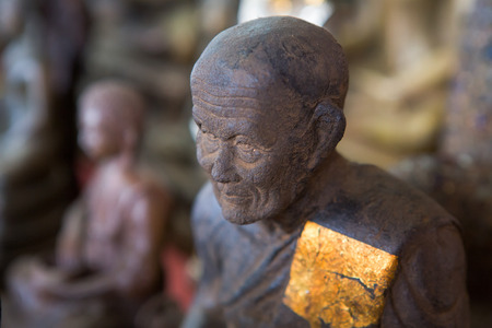 buddha statue with Gold leaf in the templeの写真素材