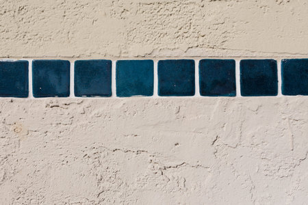 tiles texture with white filling on cement wall