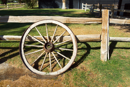 Retro style old cartwheel, wild west concept, Death Valley, USA.の写真素材