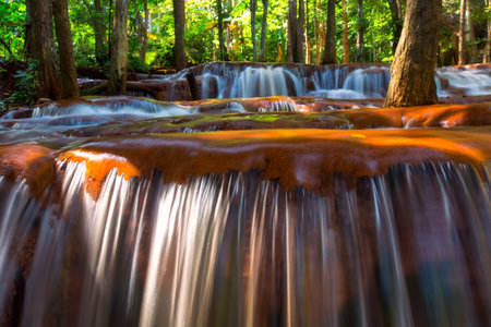 Beautiful waterfall in deep forest, Pa Wai Waterfall in tropical rain forest, Khirirat, Phop Phra,...