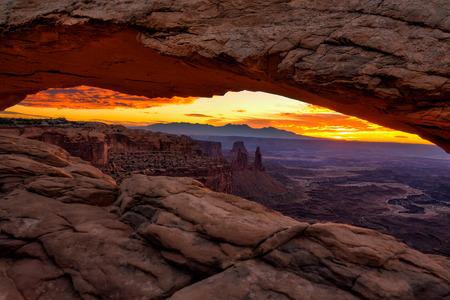 Sunrise at Mesa Arch in Canyonlands National Park near Moab, Utah, USAの写真素材