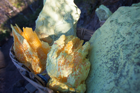 Sulfur carriers basket at Kawah Ijen, Indonesiaの写真素材