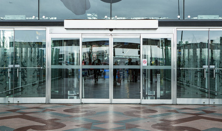 airport terminal building gate entrance and automatic glass doorの写真素材