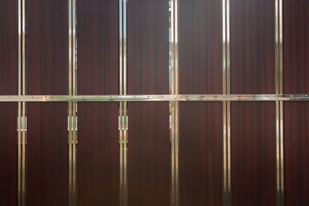 modern wrought stainless steel and wood fence