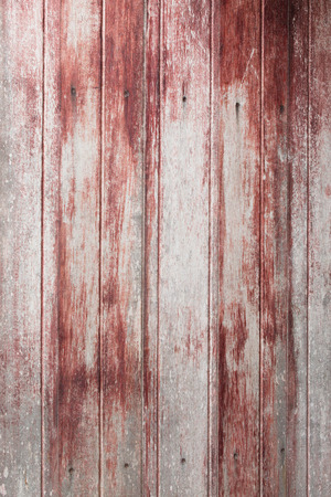 Vintage wood background and texture with red peeling paint.の写真素材