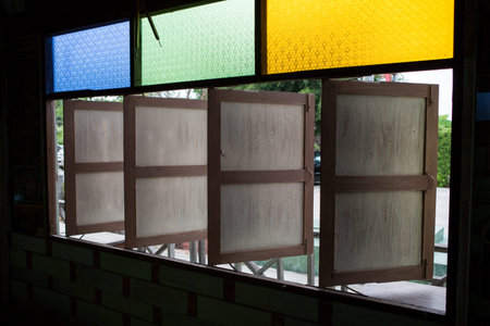 vintage window of old wooden house in Thailandの写真素材