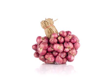 shallots isolate on white backgroundの写真素材
