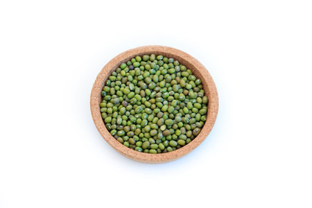 Mung beans in bowl isolated on white background.の写真素材