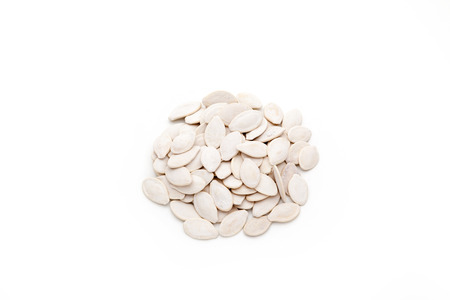 Pumpkin seeds isolated on white background.の写真素材