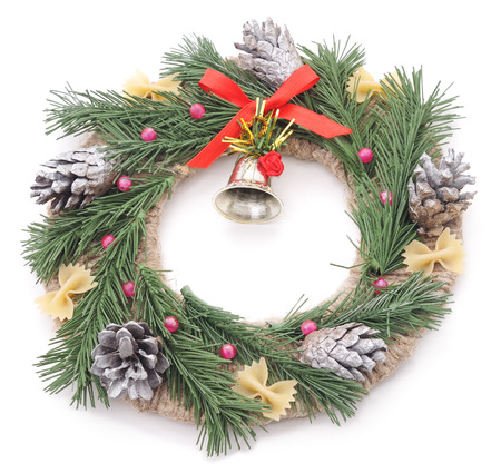 Christmas wreath with bell isolated on a white background.の写真素材