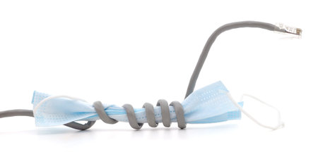 Internet cable smothering medical mask isolated on white background.