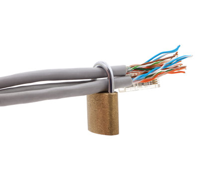 Internet cables locked with a lock isolated on a white background.
