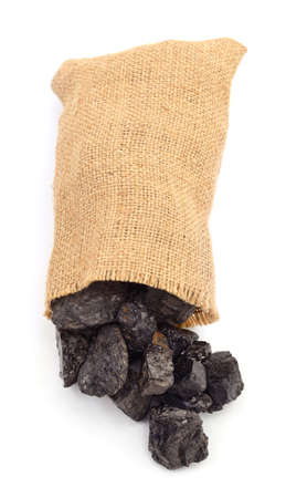 Coal in a bag isolated on a white background.の写真素材