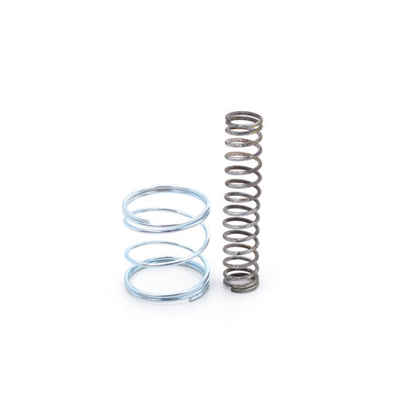 Old and new springs isolated on a white background.の写真素材