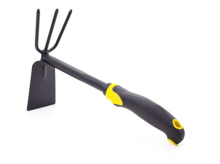 Single garden rake isolated on a white background.の写真素材