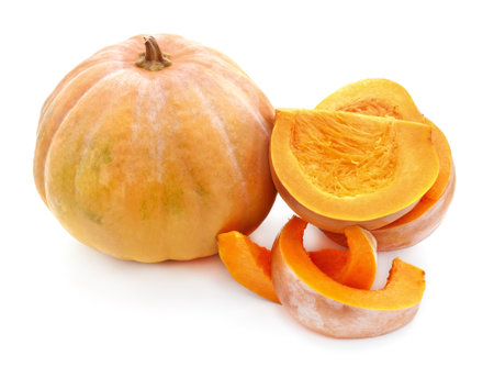 Pumpkin and slices isolated on a white background.の写真素材