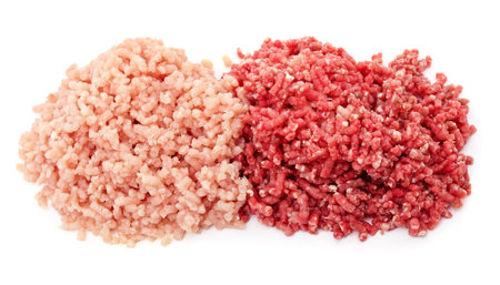 Chicken and pork minced meat isolated on a white background.の写真素材