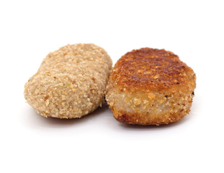 Two fried cutlets isolated on white background.の写真素材