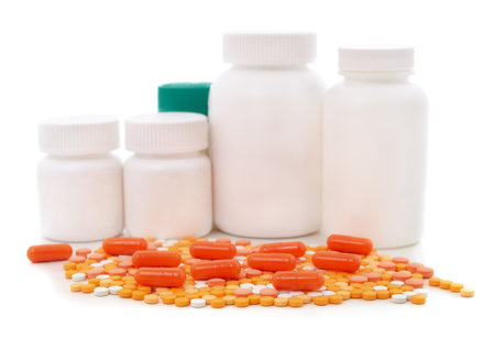 Pills, capsules and jars isolated on a white background.の写真素材