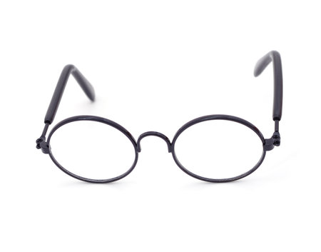 Round black metal glasses isolated on a white background.の写真素材