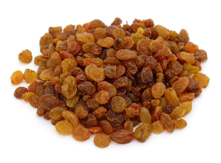 Bunch of dried raisins isolated on a white background.の写真素材