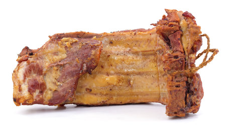 Smoked piece of meat isolated on a white background.の写真素材