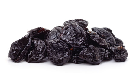 Pile of prunes isolated on a white background.の写真素材