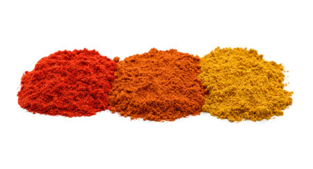 Three piles of spices isolated on a white background.の写真素材