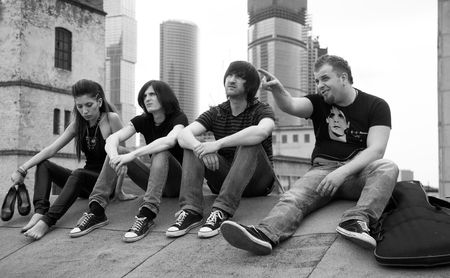 Group of musicians on a roof. A genre sketch on a roof.の写真素材