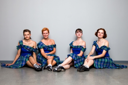 Group of dancers of the Scottish dance in kiltsの写真素材