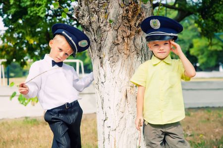 Two little boys in peak-capsの写真素材