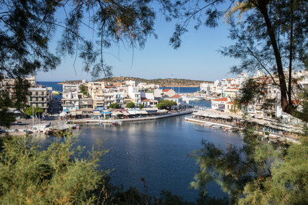 The city of Agios Nikolaos on the island of Crete Greece. Types of the city. Lake Vulismeniのeditorial素材