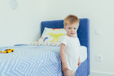 little boy playing in his roomの写真素材