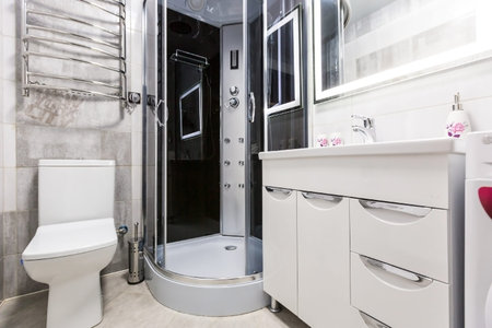 bathroom interior with beautiful ceramic tiles and showerの写真素材