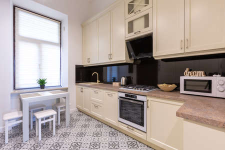 Interior photography, beige kitchen, modern style, real apartmentの写真素材