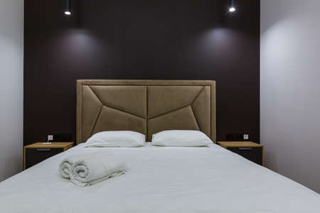 Interior photography, modern bedroom, loft style with large bedの写真素材