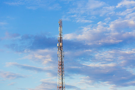 Large TV and radar antenna with 5G on a sky background