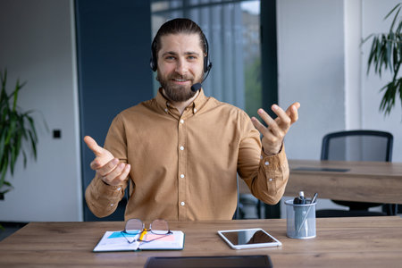 Confident professional participating in an engaging video conference call wearing a headset.