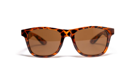 Sunglasses with leopard print and brown lenses isolated on white backgroundの写真素材