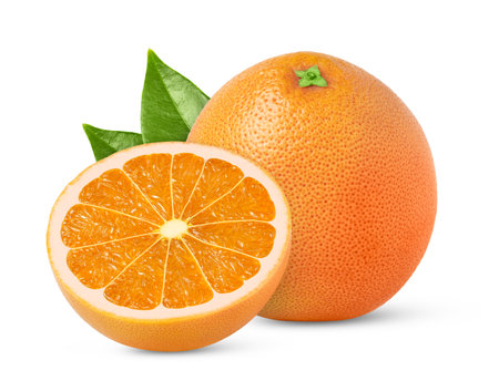 Orange fruit with cut in half and green leaf isolated.の写真素材