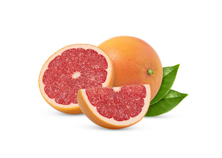 Whole grapefruit and cut in a half and a slice isolated with green leaf. Grapefruits and green leaves with clipping path.の写真素材